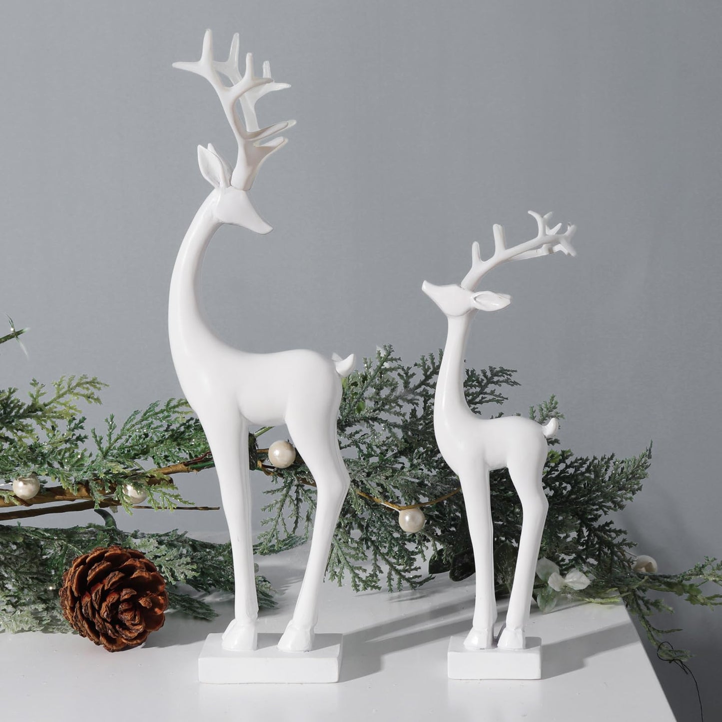 Pawliss Resin Christmas Reindeer Figurines: 2pcs White Christmas Deer Statues, Elegant Accent Winter Deer Table Ornaments, Classic Gifts Xmas Decorations for The Home