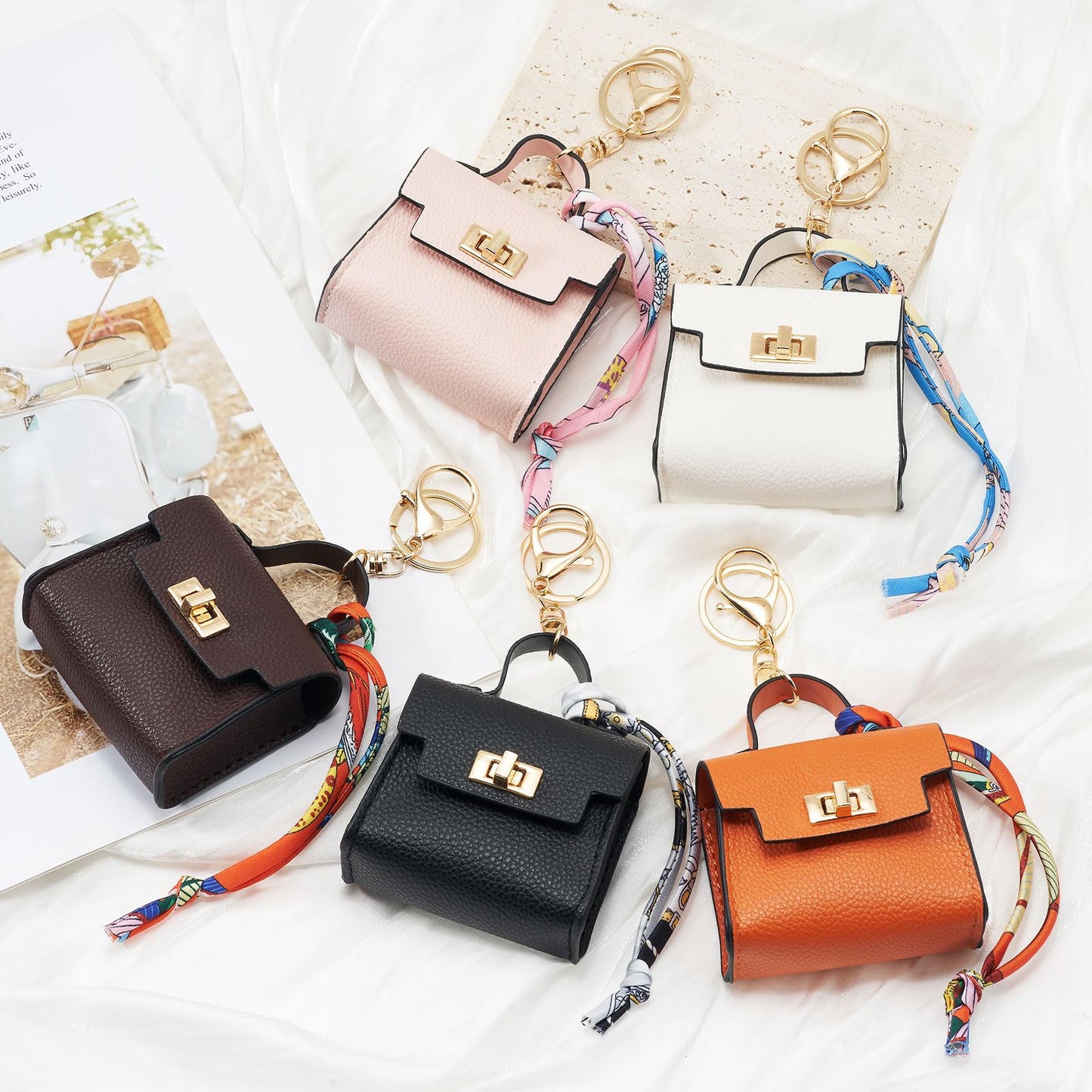 WOZEAH Mini Backpack Keychain for Women,Small Change Pouch Coin Purse Twist-lock with Key Headset Bag(Orange)