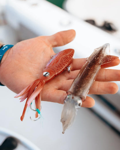 Nomad Design Squidtrex Patented Vibrating Fishing Lure- Scent Added TPE Soft Plastic Lure for Saltwater w/Strong BKK Assist Hooks, Fishing Bait that Catches Many Species, 95mm, 3 3/4", 1oz- Cali Red