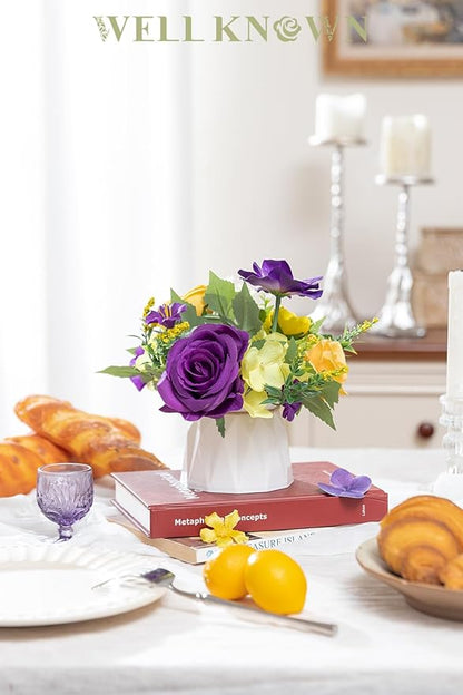 WELL KNOWN Small Fake Flowers in Plastic Vase 7" Centerpieces Coffee Table Decor, Silk Flower Arrangements for Home Decor Indoor Artificial Flower Bouquet for Dining Room Kitchen Wedding Yellow Purple