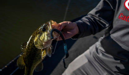 Berkley PowerBait® Power Worm Fishing Bait, Black, 4in | 10cm, Irresistible Flavor, Classic Curly Tail Worm Profile, Ideal for Spring, Summer and Fall Fishing