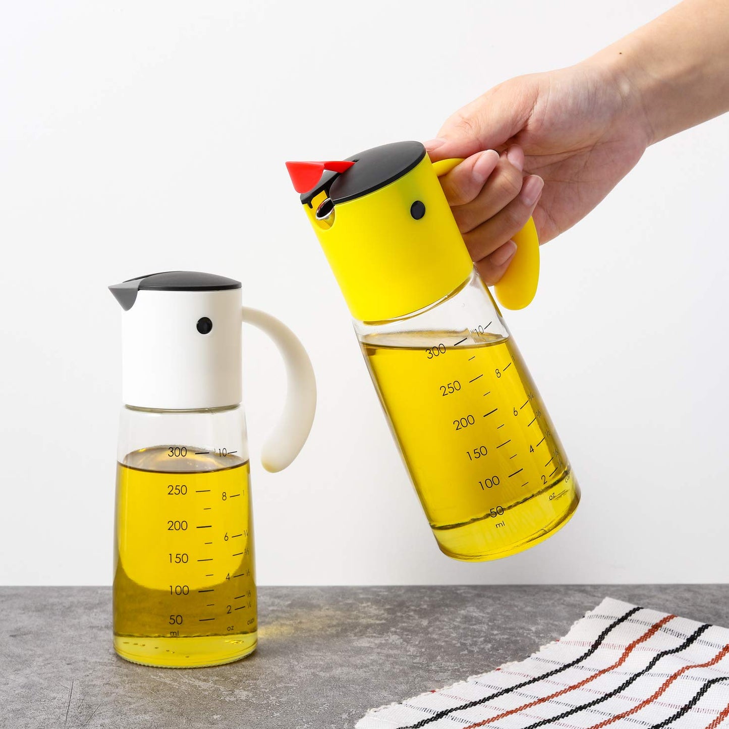 Vucchini Olive Oil Dispenser Bottle for Kitchen Cooking 10 oz - Auto Flip Vinegar Dispenser Container- Leakproof Glass Cruet with Non-Drip Spout Dispenser (white and yellow)