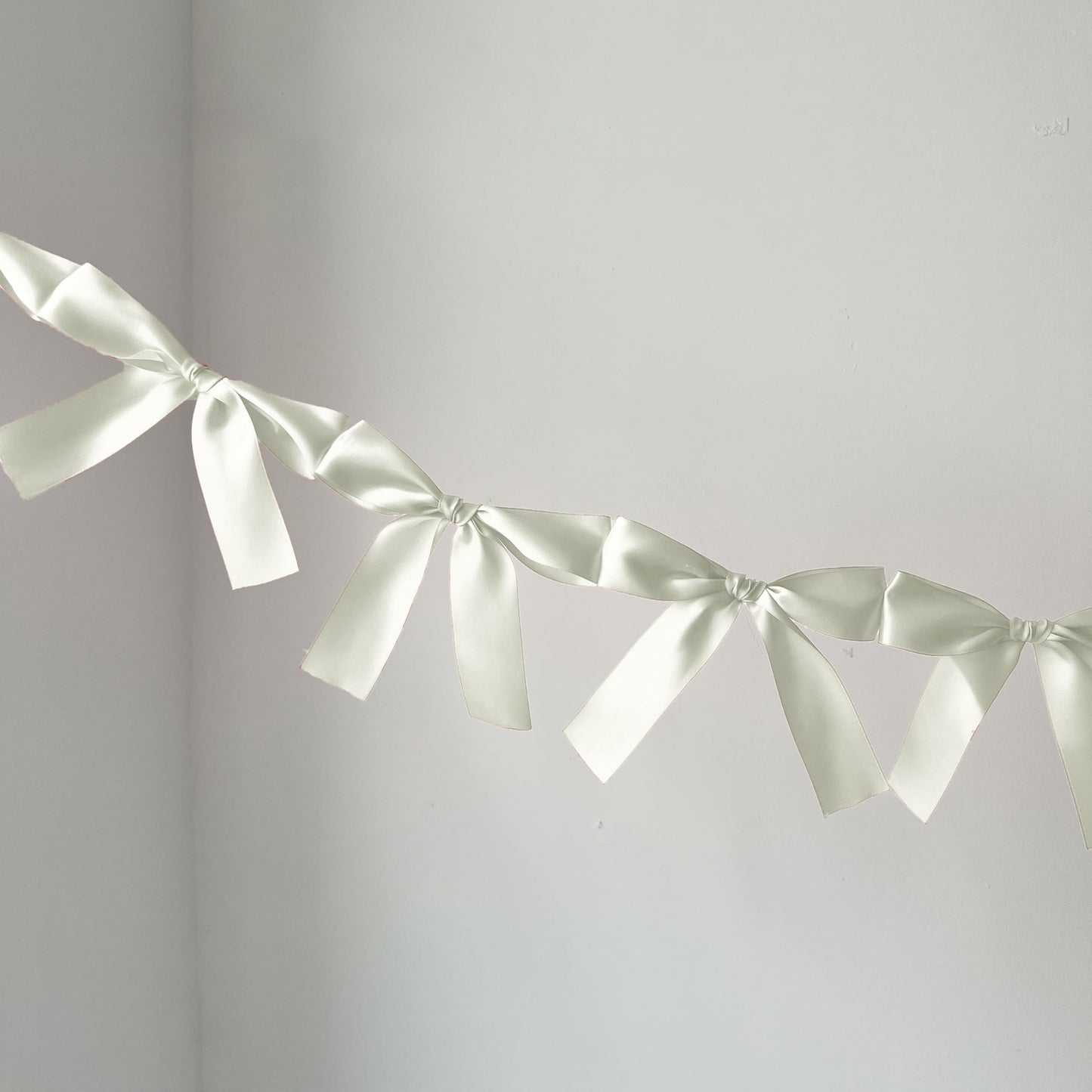 Eanjia Bow Knot Garland | 6ft Linking Satin Bow Banner with 3ft Extend Ribbon for Coquette Bachelorette Party, Baby Shower,Bridal Shower Wedding Baby Room Bed Decor (Ivory, 6ft)