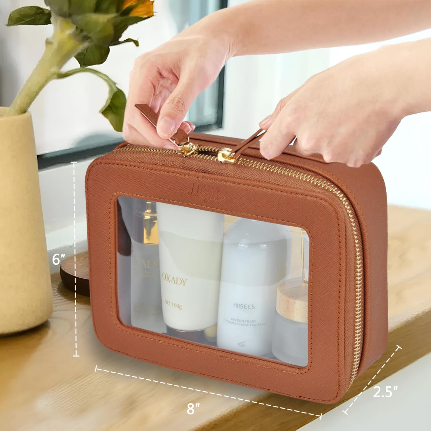 NGIL Clear Faux Leather Travel Toiletry Bag, Makeup Bag Organizer for Women, Clear Window & Gold Zipper Makeup Bag, Road Trip Essential, Skincare, Cruise Ship Essentials (Brown)