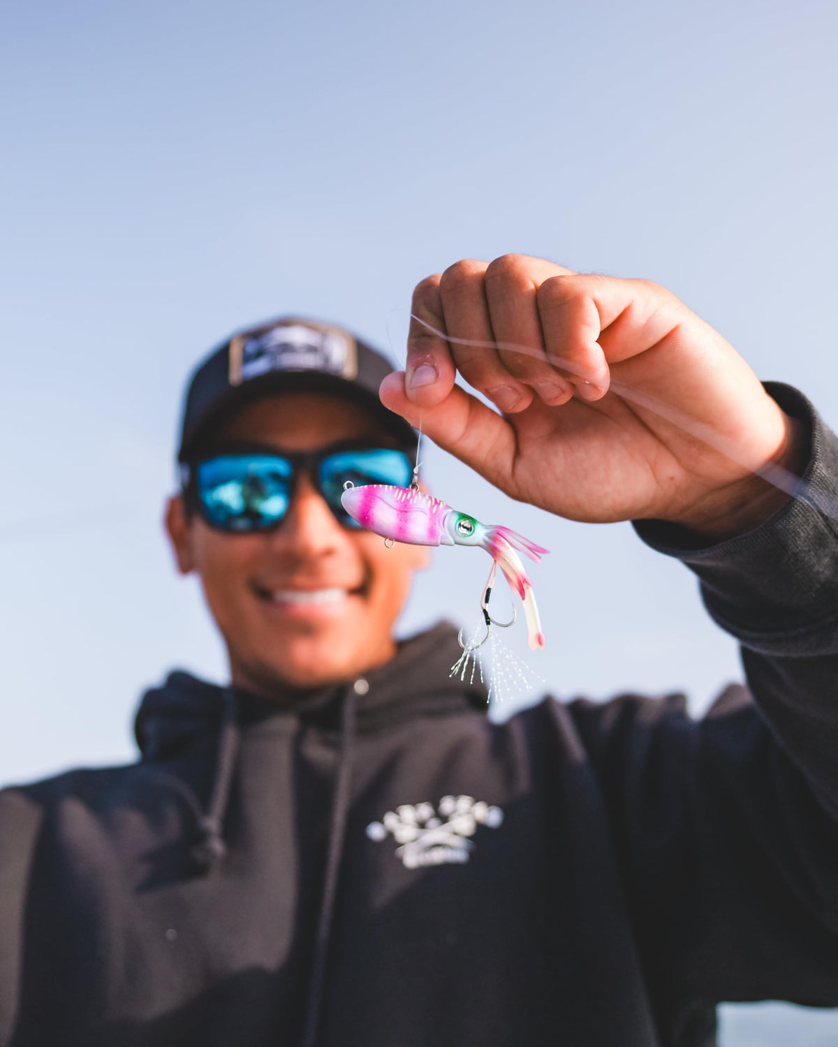 Nomad Design Squidtrex Patented Vibrating Fishing Lure- Scent Added TPE Soft Plastic Lure for Saltwater w/Strong BKK Assist Hooks, Fishing Bait that Catches Many Species, 75mm 1/2oz- Holo Ghost Shad