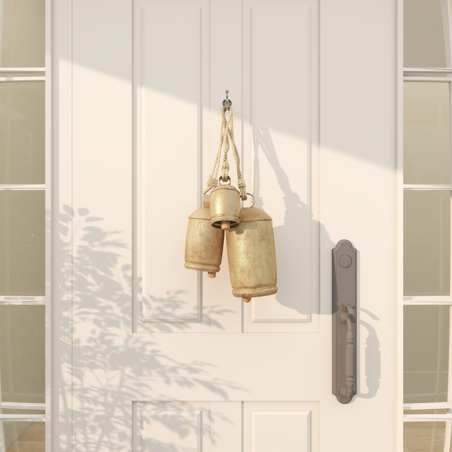 Deco 79 Metal Tibetan Inspired Decorative Cow Bells with Jute Hanging Rope, Set of 3 10", 7", 5"H, Gold