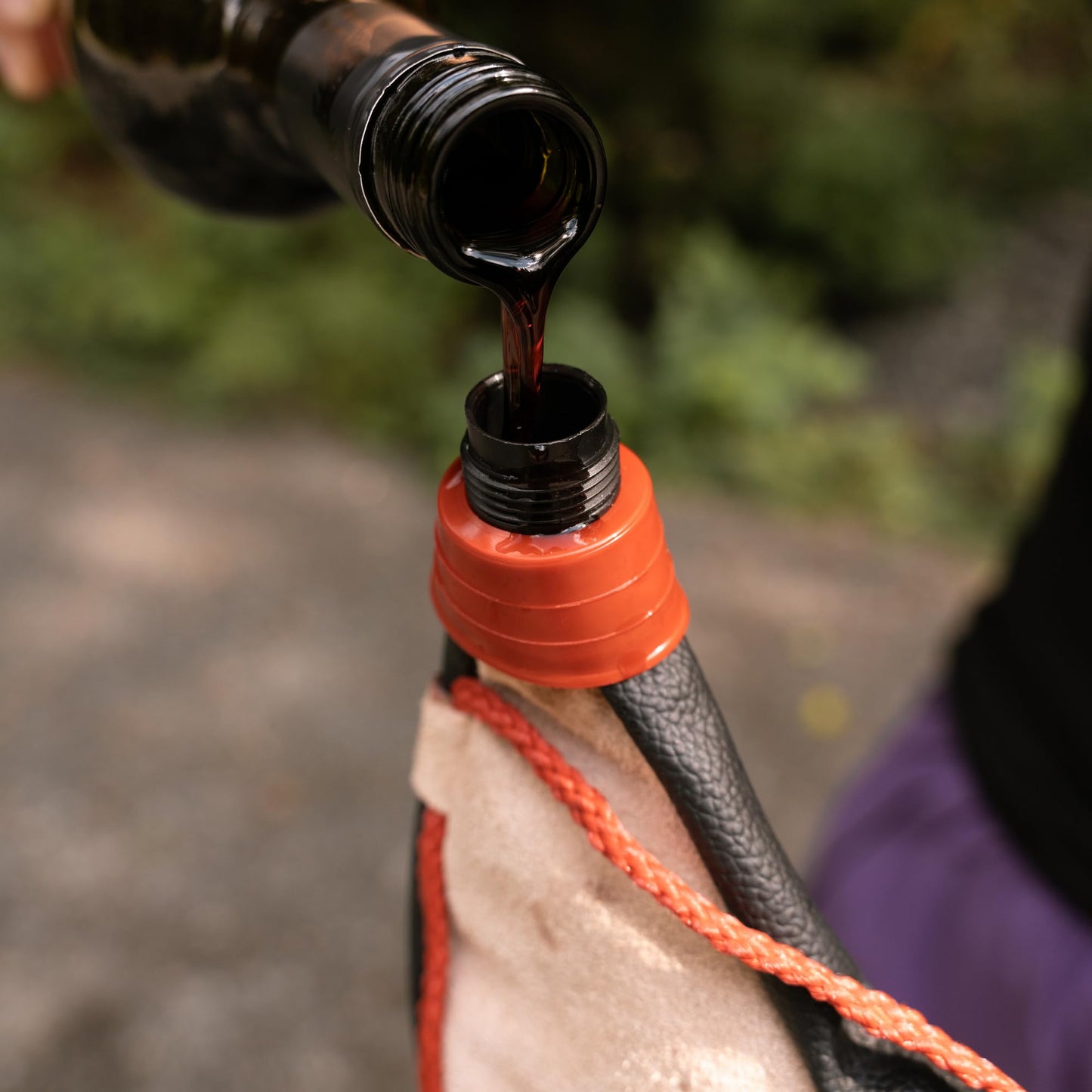 Coghlan's Traditional Spanish Bota Bag, 0.26 Gallon (1 Liter) Leather Wine Flask with Braided Strap – Durable Poly Lining for Camping, Hiking, and Outdoor Adventures