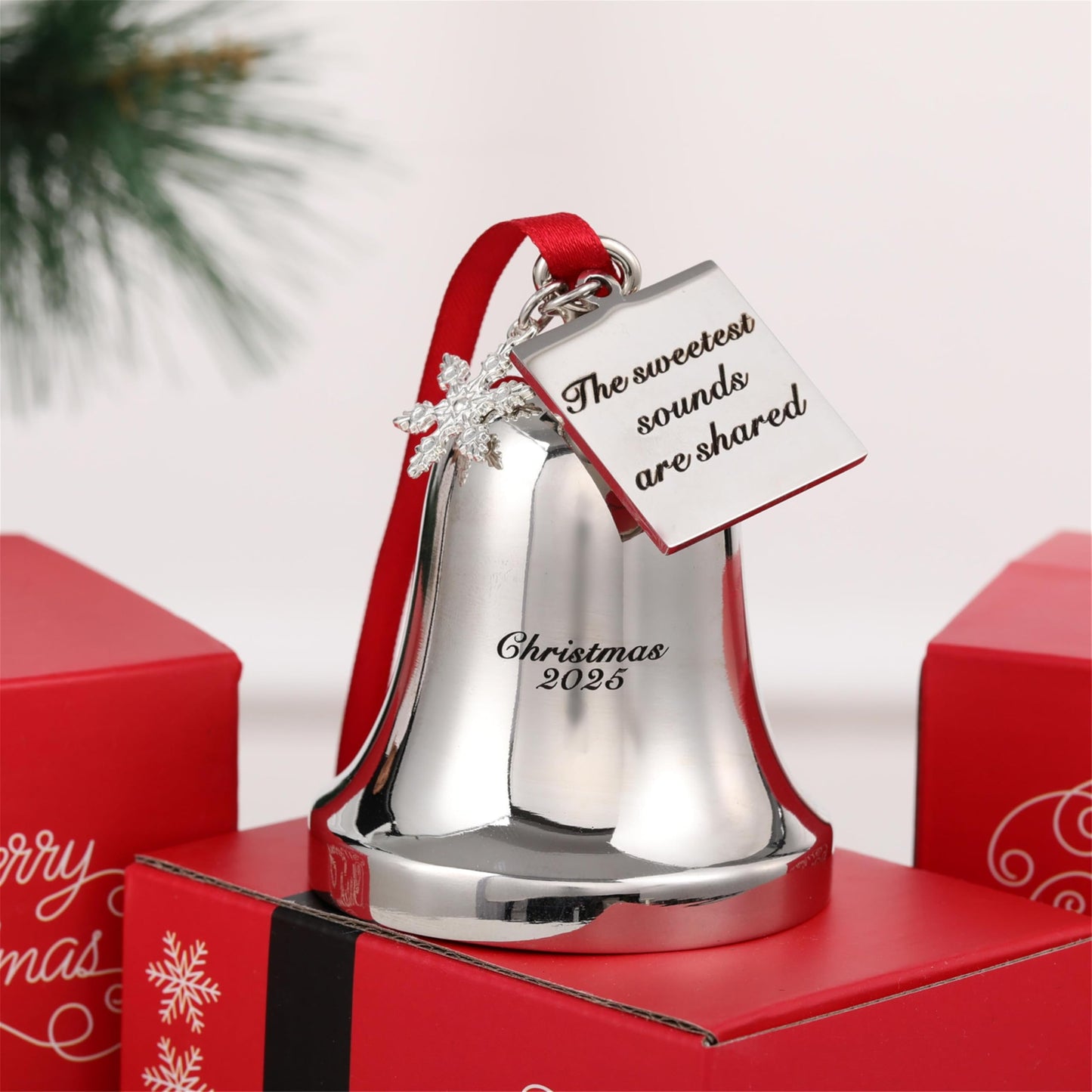FKOG Christmas Bell Ornament 2026, Silver Metal with Snowflake Charm, Red Ribbon, Quote - The Sweetest Sounds are Shared Design, Holiday Tree Decoration, 3x2.4x2.4 Inches (Silver)