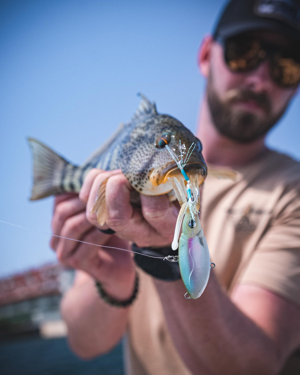 Nomad Design Squidtrex Patented Vibrating Fishing Lure- Scent Added TPE Soft Plastic Lure for Saltwater w/Strong BKK Assist Hooks, Fishing Bait that Catches Many Species, 75mm 1/2oz- Holo Ghost Shad