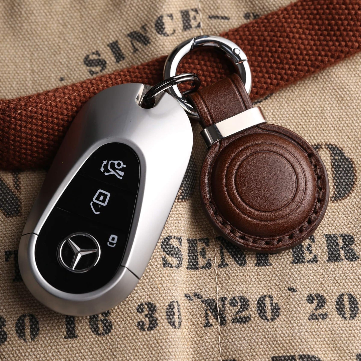 Jayanes Genuine Leather AirTag Keychain Holder - Compatible with Apple AirTag Holder Keychain, Secure Hidden Air Tag Case Cover Key Chain Ring Fob Accessories (Dark Brown)