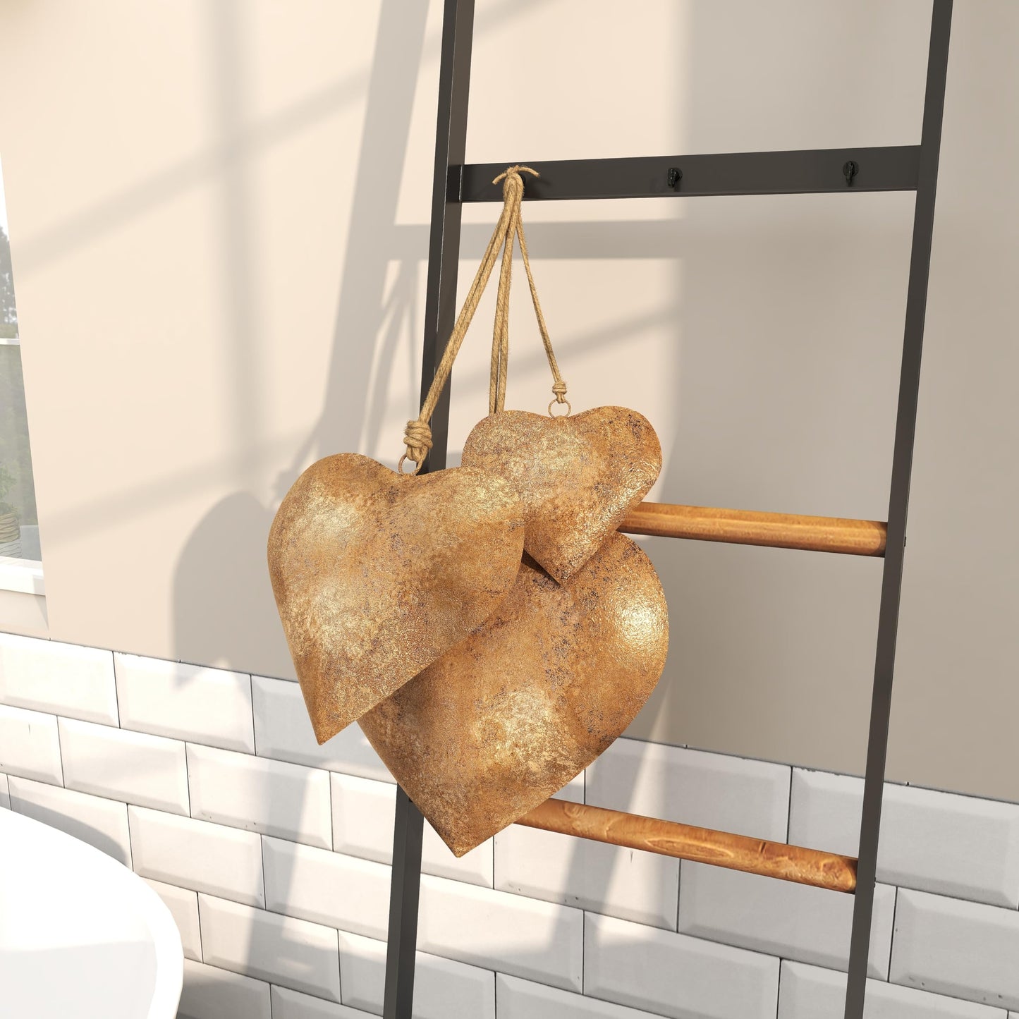 Deco 79 Metal Heart Decorative Bells Tibetan Inspired Weathered with Jute Hanging Rope, Set of 3 20", 17", 12"H, Gold