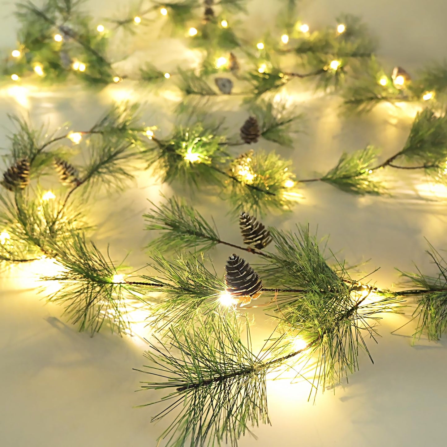 Pre-lit Christmas Garland with Lights 9.84 FT Smokey Pine Garlands 40 LED Fairy Lights Battery Operated with Timer Pine Cones Artificial Greenery Garland Wreath for Christmas Home Mantle Stairs Decor