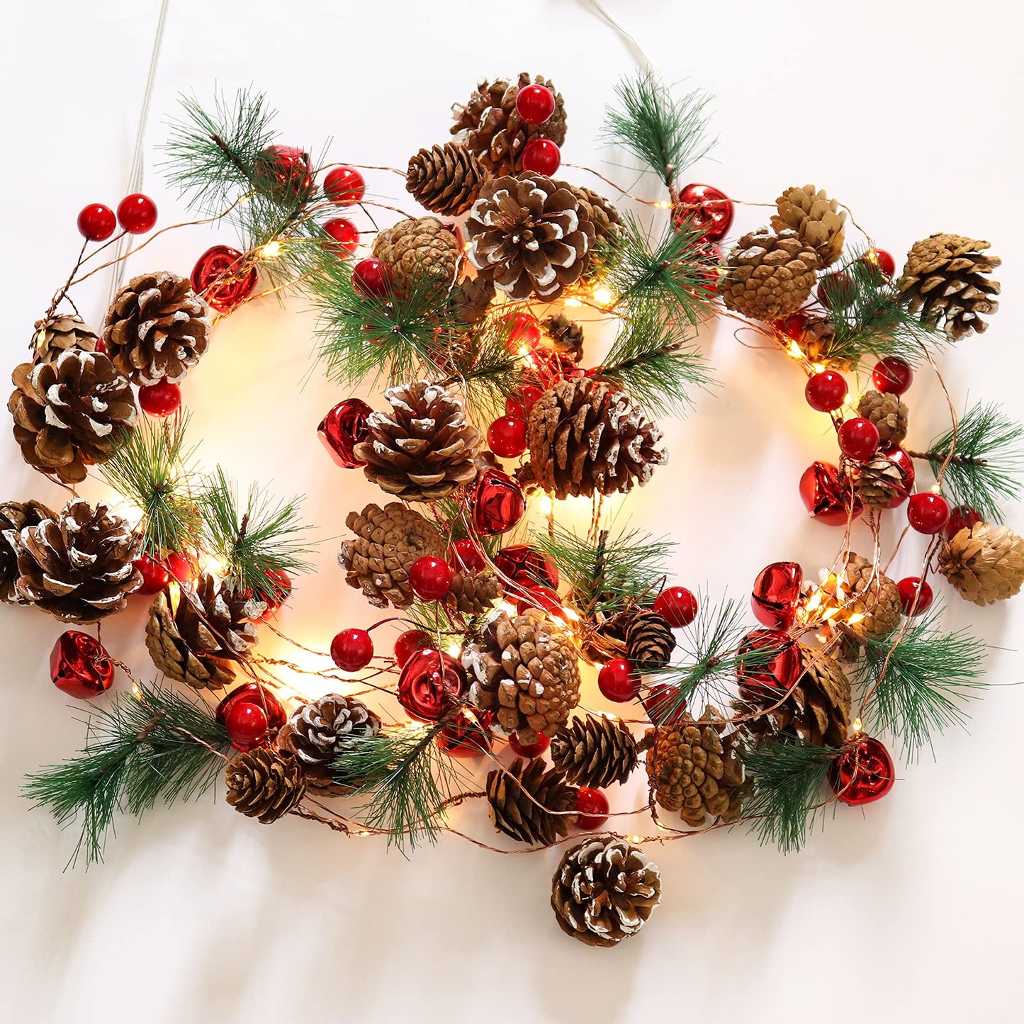 RECUTMS Christmas Garland Decoration with Lights,2PCS 7FT 20LED Pine Cone Red Berry Bell Battery Operated Christma String Light, Lighted Up Pinecone Vine Indoor Xmas Tree New Year Holiday Party Decor