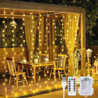 JMEXSUSS 200 LED Curtain Lights Battery Operated & USB Plug in, 8 Modes Warm White Christmas Curtain String Lights for Backdrop Bedroom Classroom Wedding Party Decorations