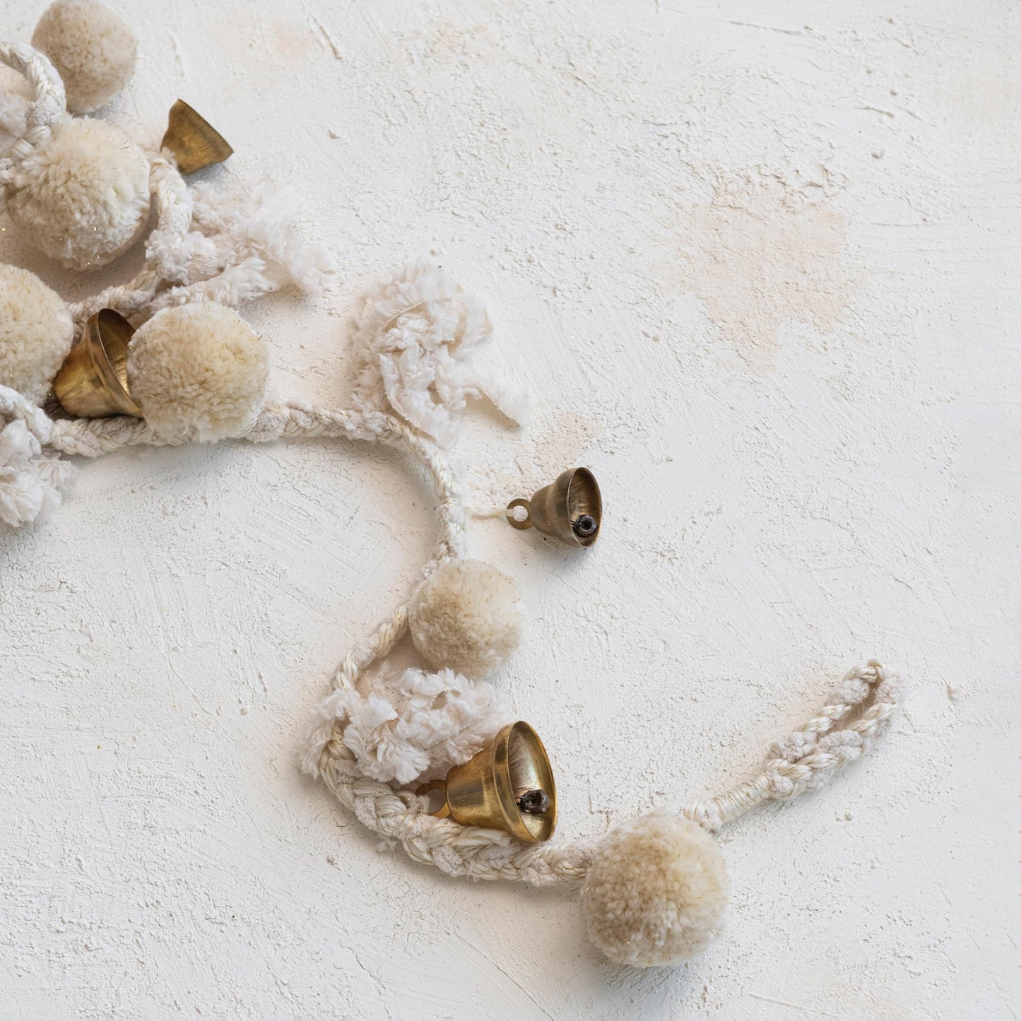 Creative Co-Op Handmade Wool and Cotton Blend Pom Pom and Bell Garland, Natural and Brass Finish